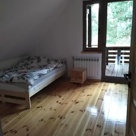 Dom Drewniany Pod Lasem Holiday home Zatory