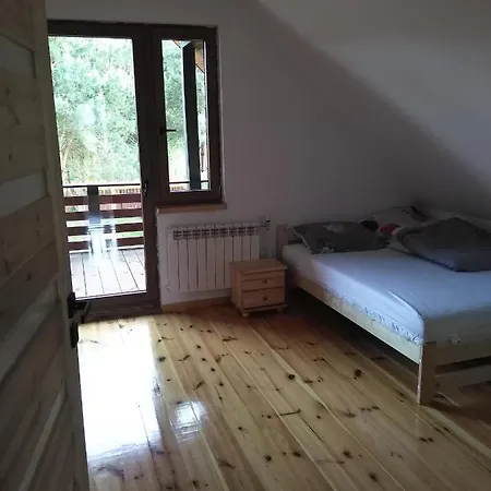 Holiday home Dom Drewniany Pod Lasem Zatory
