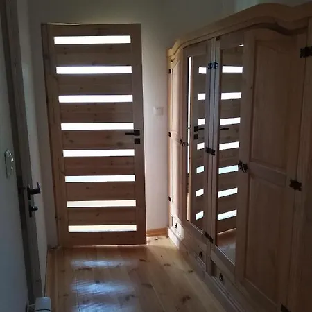 Holiday home Dom Drewniany Pod Lasem