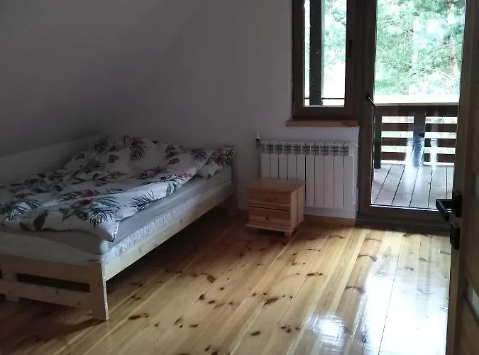 Dom Drewniany Pod Lasem Holiday home Zatory