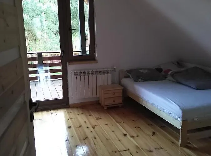 Holiday home Dom Drewniany Pod Lasem Zatory