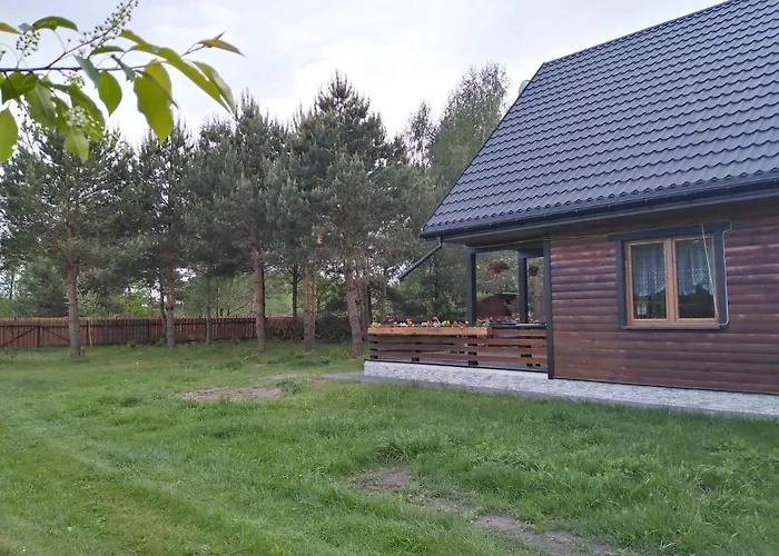 Dom Drewniany Pod Lasem Holiday home *